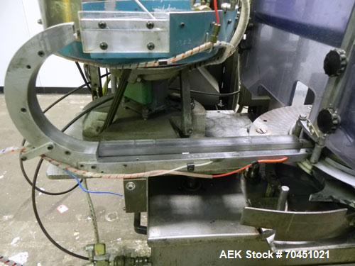 Used Haumiller Model Lasta Stainless Steel 6-Pocket Spray Tip Applicator. Single Hammer, 16” vibratory feeder bowl. Approximate 24” x 24” x 12” deep hopper. Allen Bradley Panel View 1000.