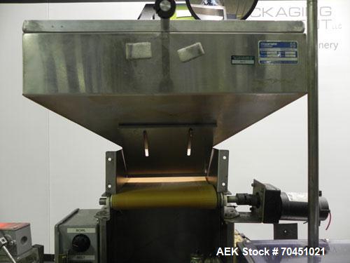 Used Haumiller Model Lasta Stainless Steel 6-Pocket Spray Tip Applicator. Single Hammer, 16” vibratory feeder bowl. Approximate 24” x 24” x 12” deep hopper. Allen Bradley Panel View 1000.