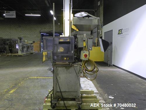 Used Haumiller Model Lasta Stainless Steel 6-Pocket Spray Tip Applicator. Machine is rated at up to 150 parts per minute. Single Hammer configuration 4.5" radius. Has a 16” vibratory feeder bowl. App...