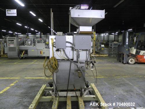 Used Haumiller Model Lasta Stainless Steel 6-Pocket Spray Tip Applicator. Machine is rated at up to 150 parts per minute. Single Hammer configuration 4.5" radius. Has a 16” vibratory feeder bowl. App...