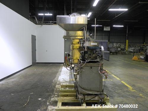 Used Haumiller Model Lasta Stainless Steel 6-Pocket Spray Tip Applicator. Machine is rated at up to 150 parts per minute. Single Hammer configuration 4.5" radius. Has a 16” vibratory feeder bowl. App...