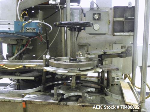 Used Haumiller Model Lasta Stainless Steel 6-Pocket Spray Tip Applicator. Machine is rated at up to 150 parts per minute. Single Hammer configuration 4.5" radius. Has a 16” vibratory feeder bowl. App...