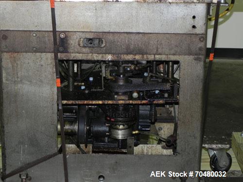 Used Haumiller Model Lasta Stainless Steel 6-Pocket Spray Tip Applicator. Machine is rated at up to 150 parts per minute. Single Hammer configuration 4.5" radius. Has a 16” vibratory feeder bowl. App...