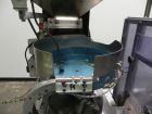 Used Haumiller Stainless Steel (6) Pocket Spray Tip Applicator. Single Hammer, 16” vibratory feeder bowl. Approximate 24” x 24” x 12” deep hopper. Allen Bradley Panel View 1000.