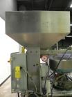 Used Haumiller Stainless Steel (6) Pocket Spray Tip Applicator. Single Hammer, 16” vibratory feeder bowl. Approximate 24” x 24” x 12” deep hopper. Allen Bradley Panel View 1000.