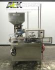 Used Haumiller model 3400 Stainless Steel (6) Pocket Spray Tip Applicator. Single Hammer, 16” vibratory feeder bowl. Approximate 24” x 24” x 12” deep hopper. Allen Bradley Panel View 1000