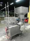 Used Haumiller model 3400 Stainless Steel (6) Pocket Spray Tip Applicator. Single Hammer, 16” vibratory feeder bowl. Approximate 24” x 24” x 12” deep hopper. Allen Bradley Panel View 1000