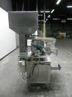 Used Haumiller model 3400 Stainless Steel (6) Pocket Spray Tip Applicator. Single Hammer, 16” vibratory feeder bowl. Approximate 24” x 24” x 12” deep hopper. Allen Bradley Panel View 1000