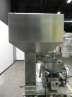 Used Haumiller model 3400 Stainless Steel (6) Pocket Spray Tip Applicator. Single Hammer, 16” vibratory feeder bowl. Approximate 24” x 24” x 12” deep hopper. Allen Bradley Panel View 1000