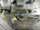 Used Haumiller model 3400 Stainless Steel (6) Pocket Spray Tip Applicator. Single Hammer, 16” vibratory feeder bowl. Approximate 24” x 24” x 12” deep hopper. Allen Bradley Panel View 1000