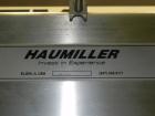 Used Haumiller model 3400 Stainless Steel (6) Pocket Spray Tip Applicator. Single Hammer, 16” vibratory feeder bowl. Approximate 24” x 24” x 12” deep hopper. Allen Bradley Panel View 1000