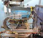 Used Haumiller Model S-Lasta Stainless Steel (6) Pocket Spray Tip Applicator. Single Hammer, 16” vibratory feeder bowl. Approximate 24” x 24” x 12” deep hopper. Allen Bradley Panel View 1000.