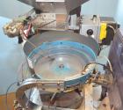 Used Haumiller Model S-Lasta Stainless Steel (6) Pocket Spray Tip Applicator. Single Hammer, 16” vibratory feeder bowl. Approximate 24” x 24” x 12” deep hopper. Allen Bradley Panel View 1000.