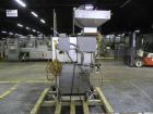 Used Haumiller Model Lasta Stainless Steel 6-Pocket Spray Tip Applicator. Machine is rated at up to 150 parts per minute. Single Hammer configuration 4.5