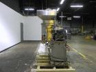 Used Haumiller Model Lasta Stainless Steel 6-Pocket Spray Tip Applicator. Machine is rated at up to 150 parts per minute. Single Hammer configuration 4.5