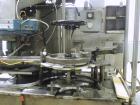 Used Haumiller Model Lasta Stainless Steel 6-Pocket Spray Tip Applicator. Machine is rated at up to 150 parts per minute. Single Hammer configuration 4.5