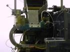 Used Haumiller Model Lasta Stainless Steel 6-Pocket Spray Tip Applicator. Machine is rated at up to 150 parts per minute. Single Hammer configuration 4.5