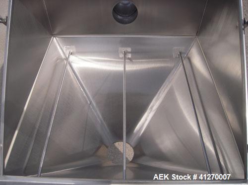 Used Hapman Non-Filtered Bag Dump Station, 304 stainless steel. Dump area 36" wide x 36" deep, hinged front door, 6’’ back opening, no product grate. Coned bottom hopper, 8" outlet. Mounted on 4 stai...