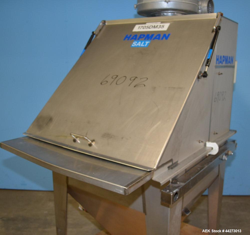 Used Hapman Vibrating Dump Station, Stainless Steel. Includes a Dust Collector. Approximate 30” long x 16” wide x 37” high dump area with grate. Dust Collector with Pulsing Air System for Cleaning Fi...
