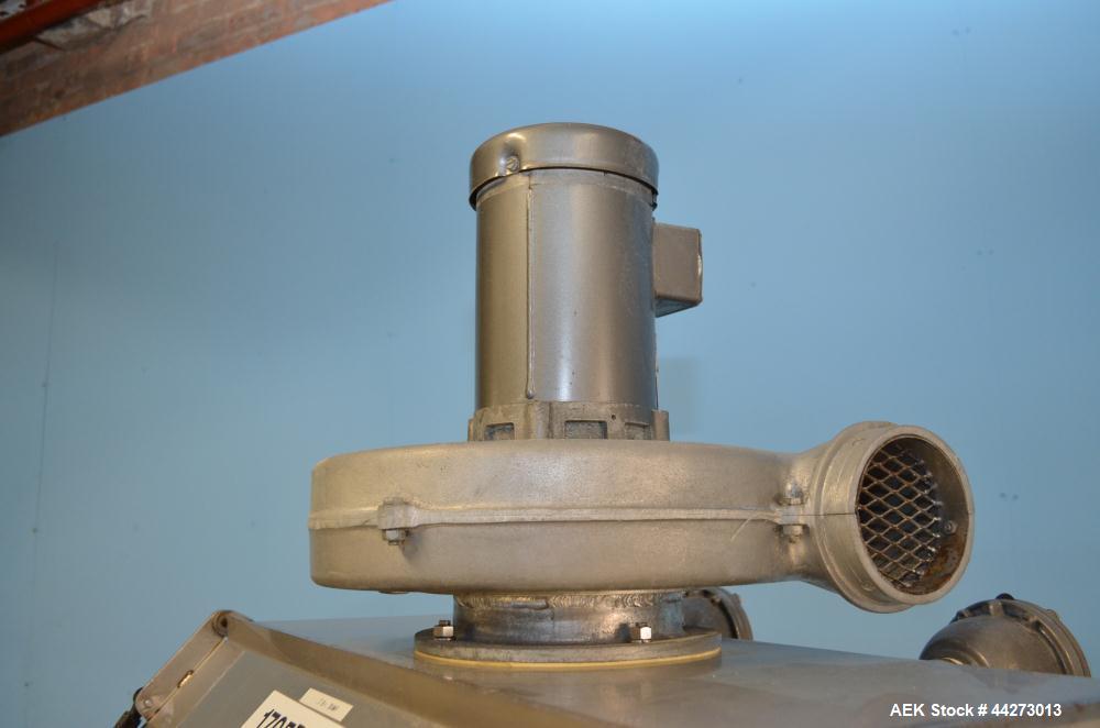 Used Hapman Vibrating Dump Station, Stainless Steel. Includes a Dust Collector. Approximate 30” long x 16” wide x 37” high dump area with grate. Dust Collector with Pulsing Air System for Cleaning Fi...