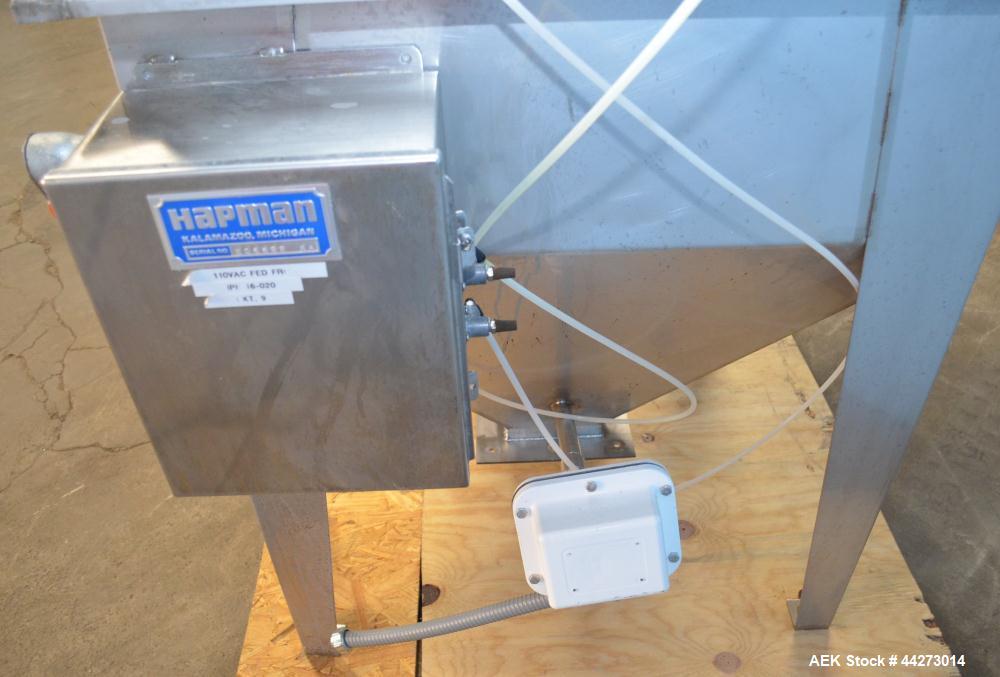 Used Hapman Vibrating Dump Station, Stainless Steel. Includes a Dust Collector. Approximate 30” long x 16” wide x 37” high dump area with grate. Dust Collector with Pulsing Air System for Cleaning Fi...