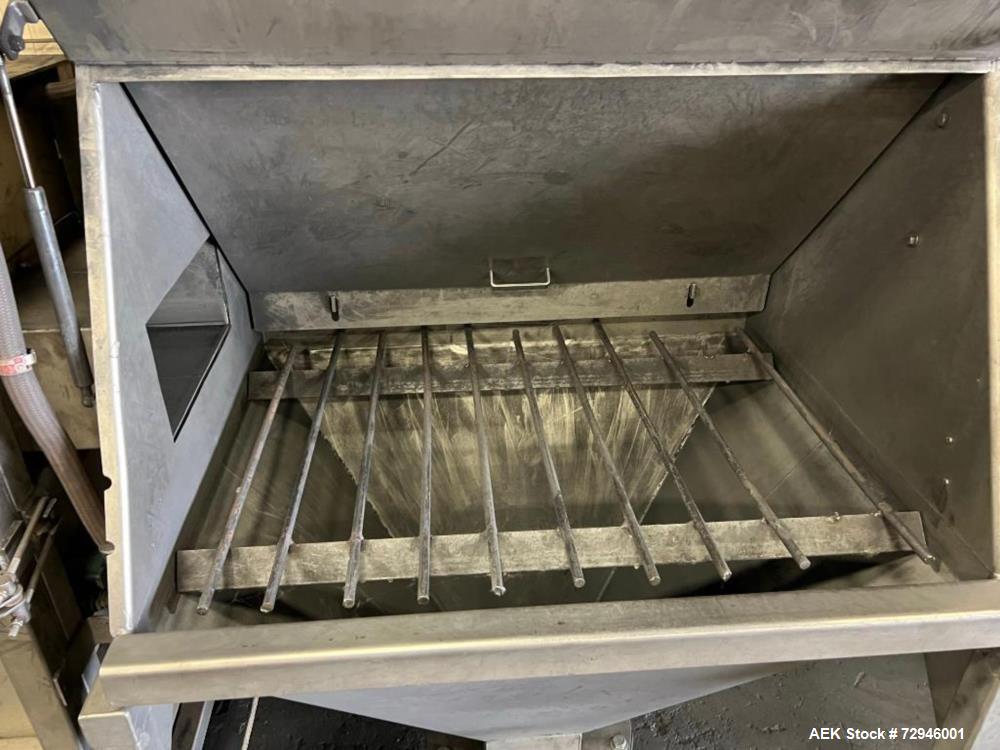 Used Vac-U-Max XP Stainless Steel Bag Dump Station with integrated dust collection and empty bag compaction. Top mount blower, 6 bags. Hydraulically operated bag compactor.