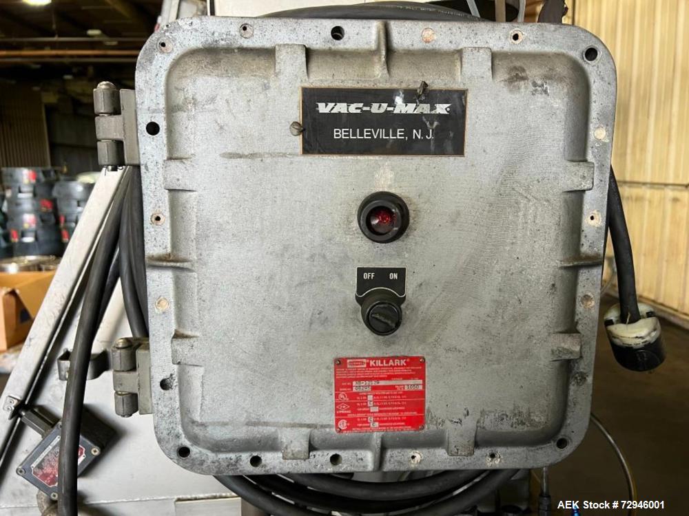 Used Vac-U-Max XP Stainless Steel Bag Dump Station with integrated dust collection and empty bag compaction. Top mount blower, 6 bags. Hydraulically operated bag compactor.