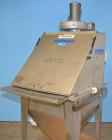 Used Hapman Vibrating Dump Station, Stainless Steel. Includes a Dust Collector. Approximate 30” long x 16” wide x 37” high dump area with grate. Dust Collector with Pulsing Air System for Cleaning Fi...