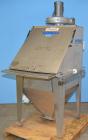 Used Hapman Vibrating Dump Station, Stainless Steel. Includes a Dust Collector. Approximate 30” long x 16” wide x 37” high dump area with grate. Dust Collector with Pulsing Air System for Cleaning Fi...