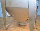 Used Hapman Vibrating Dump Station, Stainless Steel. Includes a Dust Collector. Approximate 30” long x 16” wide x 37” high dump area with grate. Dust Collector with Pulsing Air System for Cleaning Fi...