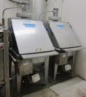 Used Hapman Vibrating Dump Station, Stainless Steel. Includes a Dust Collector. Approximate 30” long x 16” wide x 37” high dump area with grate. Dust Collector with Pulsing Air System for Cleaning Fi...