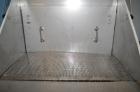 Used Hapman Vibrating Dump Station, Stainless Steel. Includes a Dust Collector. Approximate 30” long x 16” wide x 37” high dump area with grate. Dust Collector with Pulsing Air System for Cleaning Fi...