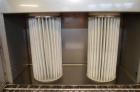 Used Hapman Vibrating Dump Station, Stainless Steel. Includes a Dust Collector. Approximate 30” long x 16” wide x 37” high dump area with grate. Dust Collector with Pulsing Air System for Cleaning Fi...
