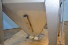 Used Hapman Vibrating Dump Station, Stainless Steel. Includes a Dust Collector. Approximate 30” long x 16” wide x 37” high dump area with grate. Dust Collector with Pulsing Air System for Cleaning Fi...