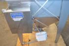 Used Hapman Vibrating Dump Station, Stainless Steel. Includes a Dust Collector. Approximate 30” long x 16” wide x 37” high dump area with grate. Dust Collector with Pulsing Air System for Cleaning Fi...