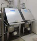 Used Hapman Vibrating Dump Station, Stainless Steel. Includes a Dust Collector. Approximate 30” long x 16” wide x 37” high dump area with grate. Dust Collector with Pulsing Air System for Cleaning Fi...