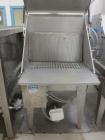 Used Hapman Vibrating Dump Station, Stainless Steel. Includes a Dust Collector. Approximate 30” long x 16” wide x 37” high dump area with grate. Dust Collector with Pulsing Air System for Cleaning Fi...