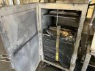 Used Vac-U-Max XP Stainless Steel Bag Dump Station with integrated dust collection and empty bag compaction. Top mount blower, 6 bags. Hydraulically operated bag compactor.