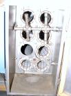 Used Young Industries Filtered Bag Dump Station, Size FBD 42-8. 304 Stainless Steel. 45’’ Wide  x 24’’ deep dump area. (7) Filter cages, (1) top mounted blower, driven by a 1-1/2 hp, 3/60/230/460 vol...