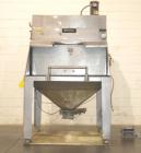 Used Young Industries Filtered Bag Dump Station, model FBD10-8-C, stainless steel. Top mounted blower, coned bottom outlet. Work area with grate.