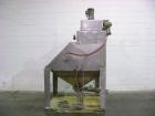 Used Young Industries Filtered Bag Dump Station, model FBD10-8-C, stainless steel. Top mounted blower, coned bottom outlet. Work area with grate.