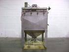 Used Young Industries Filtered Bag Dump Station, model FBD10-8-C, stainless steel. Top mounted blower, coned bottom outlet. Work area with grate.