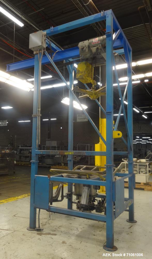 Used Material Transfer & Storage, Inc Bulk Bag Supersack Unloader. Machine includes (1) Harrington 2-ton (4,000 pound) electronic crane, Flo-Master massagers, sure-seal spout clamping system and a Vo...