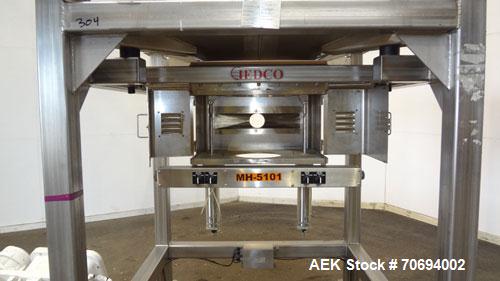 Used IEDCO Bulk Bag Discharge Station, Model 10286-BBU-5101, 304 Stainless Steel. (1) Top frame section approximately 63" long x 63" wide x 84" tall, (1) bottom frame section approximately 63" long x...