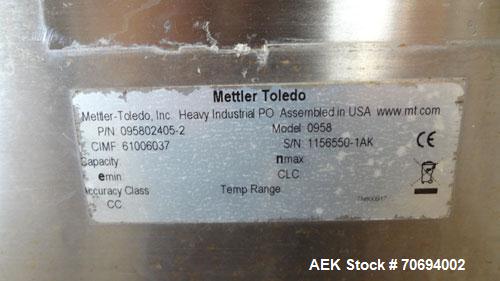 Used IEDCO Bulk Bag Discharge Station, Model 10286-BBU-5101, 304 Stainless Steel. (1) Top frame section approximately 63" long x 63" wide x 84" tall, (1) bottom frame section approximately 63" long x...