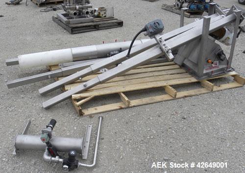 Used Super Sack Unloader, 304 Stainless Steel. (1) Frame with top height adjustment, 1 bag holder I beam ( no hoist), (2) bag valves. Includes (3) Flexicon screw conveyor drive ends (no tubes or scre...