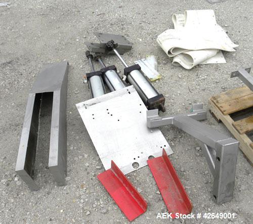Used Super Sack Unloader, 304 Stainless Steel. (1) Frame with top height adjustment, 1 bag holder I beam ( no hoist), (2) bag valves. Includes (3) Flexicon screw conveyor drive ends (no tubes or scre...