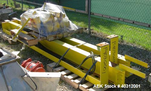 Used Supersack Unloading Station consisting of:  (2) Budgit 1 ton hoist with rails, and motor driven trollies; (2) Vibco vibrating dischargers, model 4P-700; (2) 30" x 30" platform scales with caster...
