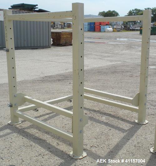 Used Adaptive Engineering & Fabrication Super-Sack Unloading System, Carbon Steel. Approximate 60’’ wide x 60’’ long x 16’ tall frame. (1) Top unloading frame section 72’’ tall with removable bag lif...