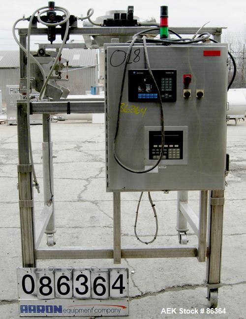 Used Supersack Unloader Consisting Of: (1) Stainless steel frame with a 12" diameter cuff, mounted on casters. MT Weigh Systems scales, model 8000HE-1K, 1000 pound capacity; (2) 304 stainless steel p...